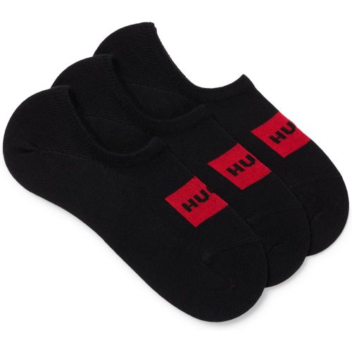 Lot de trois paires de chaussettes invisibles à logos rouges - HUGO - Modalova