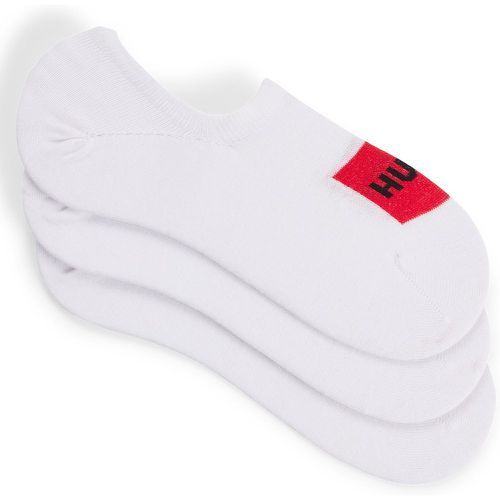 Lot de trois paires de chaussettes invisibles à motif étiquette logo rouge - HUGO - Modalova
