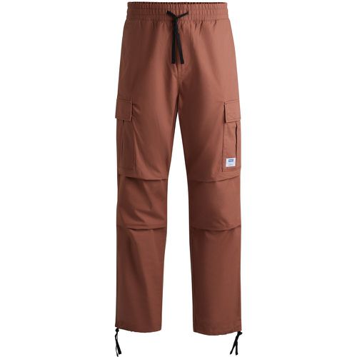 Pantalon cargo Relaxed Fit en coton structuré - HUGO - Modalova