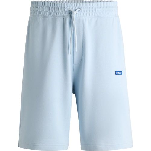 Short en molleton de coton avec cordon de serrage et étiquette logotée bleue - HUGO - Modalova
