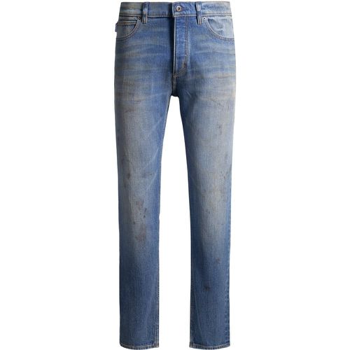 Jean Tapered en denim à délavage effet boue - HUGO - Modalova