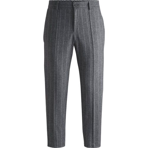 Pantalon Tapered Dressletic en jersey stretch performant à rayures - Boss - Modalova