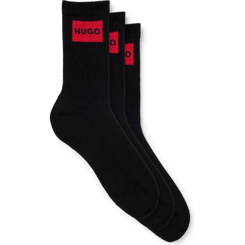 Lot de trois paires de chaussettes courtes avec étiquettes logotées rouges - HUGO - Modalova