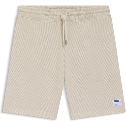 Short ample en coton mélangé à la structure gaufrée - HUGO - Modalova