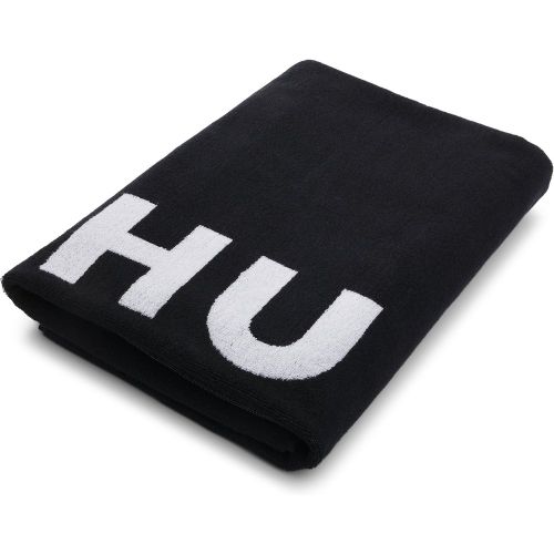 Drap de plage en jacquard de molleton de coton avec logo revisité - HUGO - Modalova