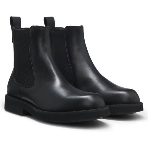 Bottines en cuir avec tirette logotée - Boss - Modalova