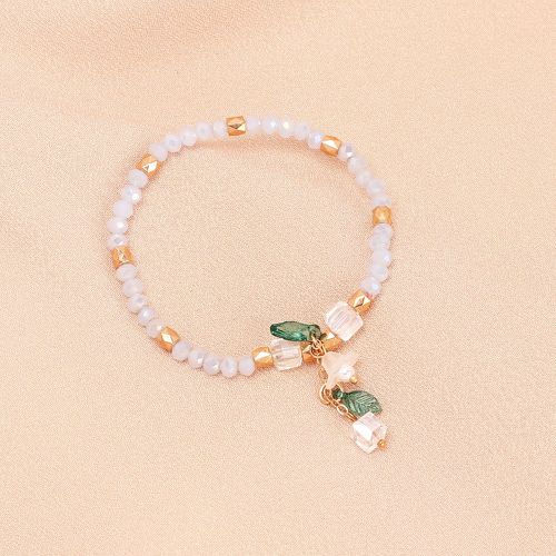 Bracelet perlé à fleur à breloque feuille - SHEIN - Modalova