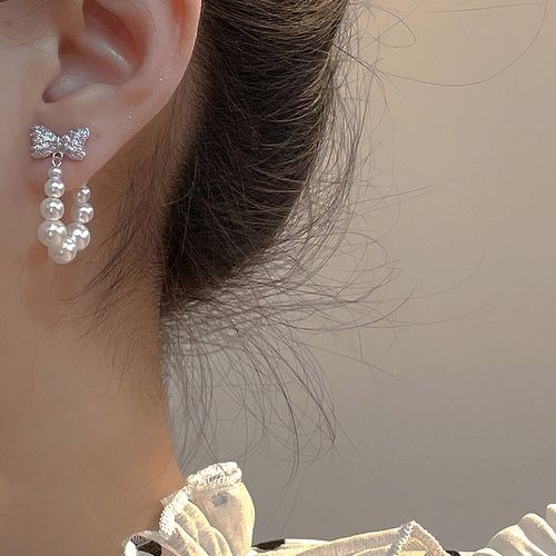 Boucles d'oreilles zircone cubique avec nœud à fausse perle - SHEIN - Modalova