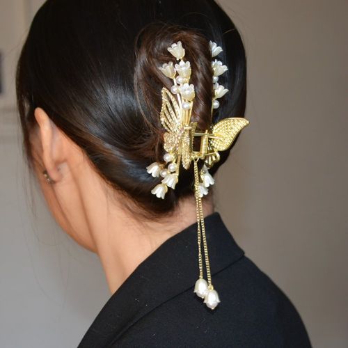 Griffe à cheveux fleur et fausse perle à strass design papillon - SHEIN - Modalova