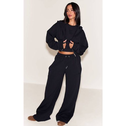 Black Jogging Petite À Jambes Larges Avec Panneaux Côtelés Entrelacés Brodés | Taille XS - PrettyLittleThing - Modalova