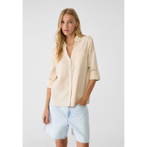 Chemise fluide avec poche avec lin XS - Stradivarius - Modalova