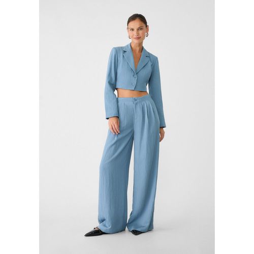 Pantalon palazzo à pinces 32 - Stradivarius - Modalova