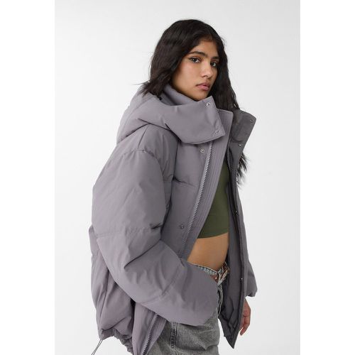 Blouson matelassé oversize à capuche XS - Stradivarius - Modalova