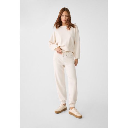 Pantalon jogger en tissu doux Écru M - Stradivarius - Modalova