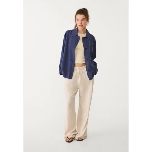 Veste fluide à poches en lin XS - Stradivarius - Modalova