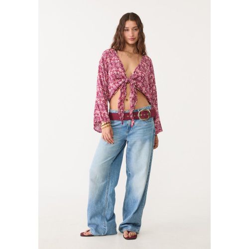 Blouse fluide à nœud XS - Stradivarius - Modalova