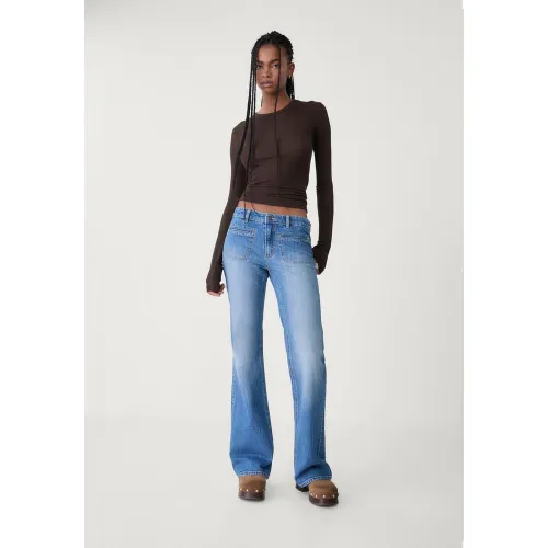 Jean flare poches 32 - Stradivarius - Modalova