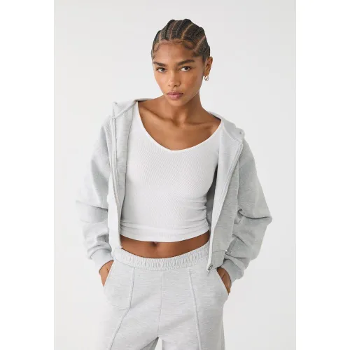 Sweat à capuche et poches XS - Stradivarius - Modalova