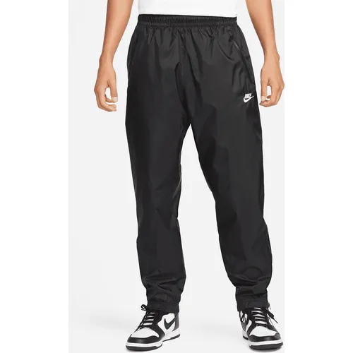 Pantalon doublé en tissu tissé Windrunner - Nike - Modalova