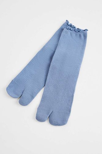 Chaussettes Tabi à bords à volants en taille: TAILLE UNIQUE - Out From Under - Modalova