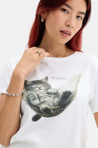T-shirt graphique décontracté UO Unbothered Kitten par en taille: Medium/Large - Urban Outfitters - Modalova