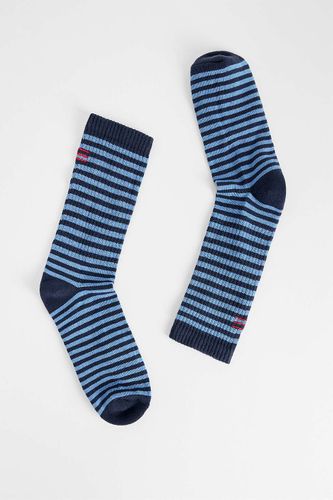Chaussettes UO à rayures tonales bleues par en taille: TAILLE UNIQUE - Urban Outfitters - Modalova