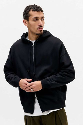 Sweat à capuche noir coupe large poids lourd en taille: Medium - United Athle - Modalova