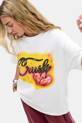 T-shirt graphique UO blanc Zara Larsson Crush par en taille: XS - Urban Outfitters - Modalova