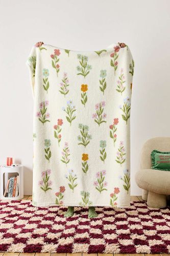 Jeté en polaire Wildflower par en taille: TAILLE UNIQUE - Urban Outfitters - Modalova