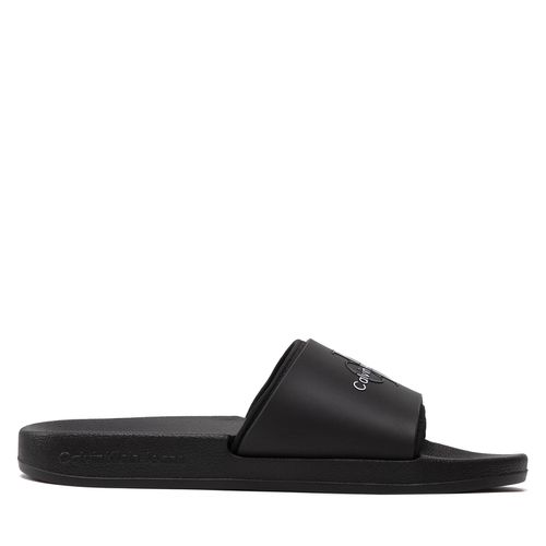Mules / sandales de bain Calvin Klein Jeans Slide Monogram Tpu YM0YM00361 Noir - Chaussures.fr - Modalova