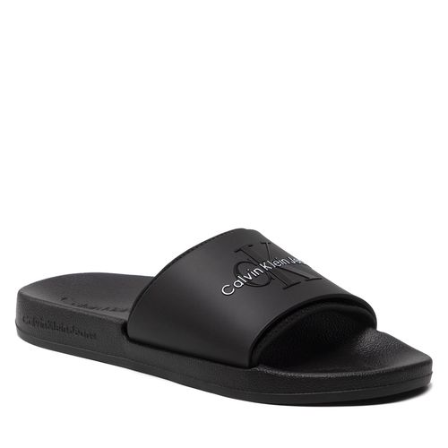 Mules / sandales de bain Calvin Klein Jeans Slide Monogram Tpu YM0YM00361 Black BDS - Chaussures.fr - Modalova