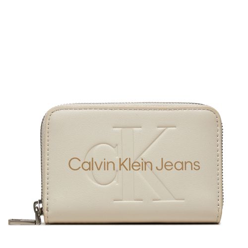 Portefeuille petit format Calvin Klein Jeans Zip Around Mono K60K612255 Écru - Chaussures.fr - Modalova