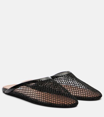 Alaïa Mules en résille et cuir verni - Alaia - Modalova