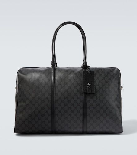 Sac de voyage en toile GG à finitions en cuir - Gucci - Modalova