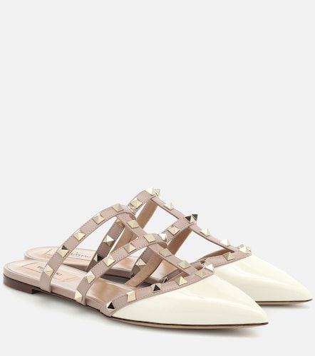 Mules Rockstud en cuir verni - Valentino Garavani - Modalova