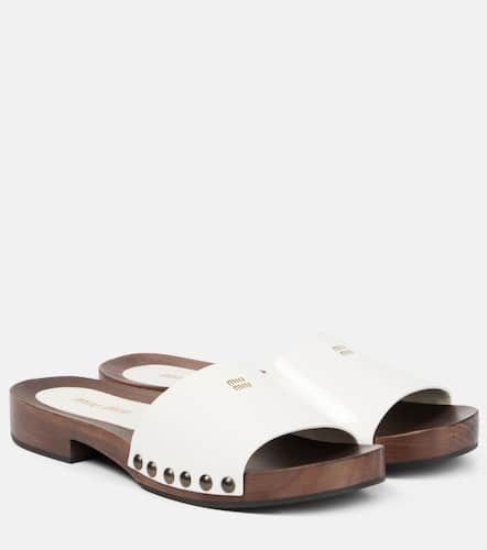 Miu Miu Mules en cuir verni - Miu Miu - Modalova