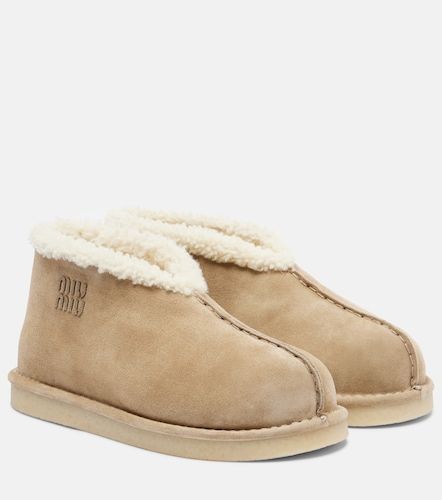 Bottines en daim et shearling - Miu Miu - Modalova