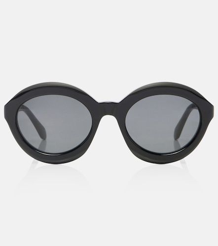 Alaïa Lunettes de soleil rondes Lettering Logo - Alaia - Modalova