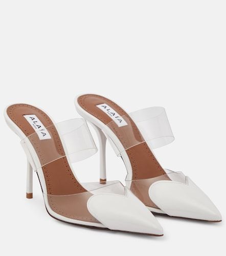 Alaïa Mules Cœur en cuir verni et PU - Alaia - Modalova