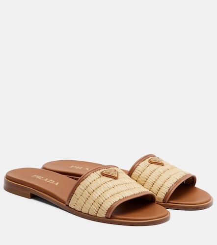 Prada Mules en cuir et raphia - Prada - Modalova