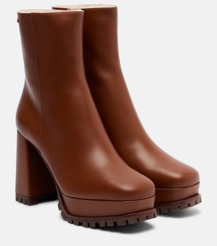 Bottines à plateau en cuir et shearling - Gianvito Rossi - Modalova