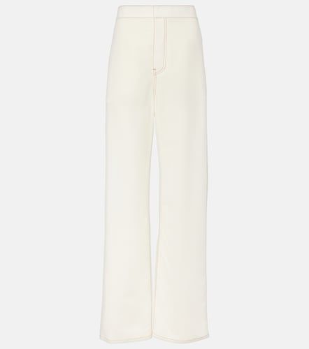 Alaïa Pantalon ample à taille haute en laine mélangée - Alaia - Modalova