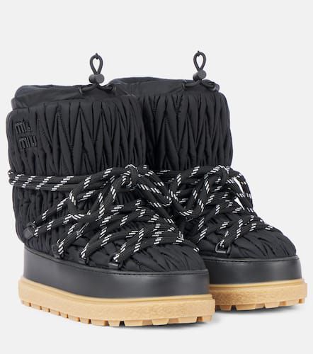 Miu Miu Bottines après-ski à logo - Miu Miu - Modalova