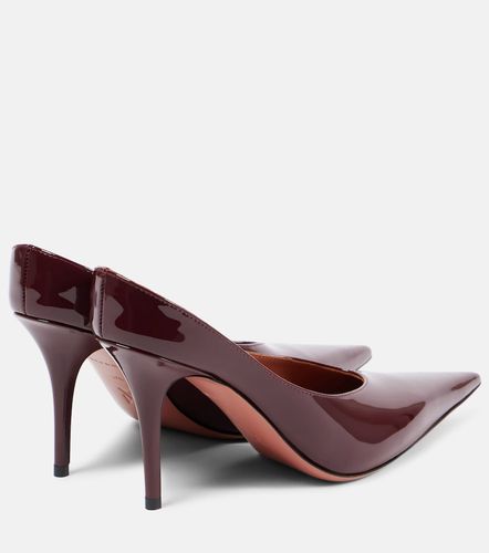 Mules Anok 90 en cuir verni - Amina Muaddi - Modalova