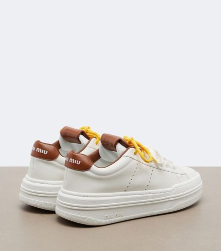 Miu Miu Baskets compensées en cuir - Miu Miu - Modalova