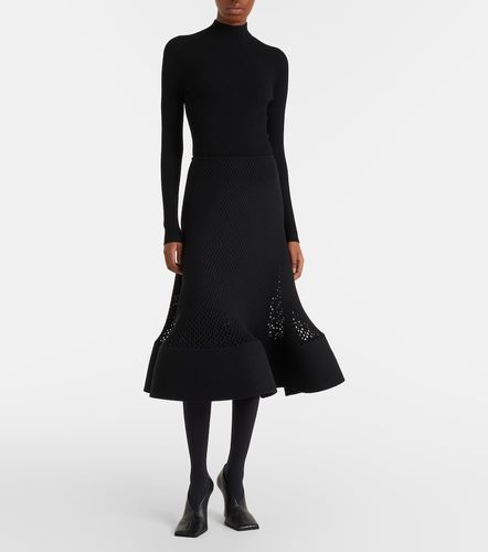 Alaïa Jupe midi en laine mélangée - Alaia - Modalova