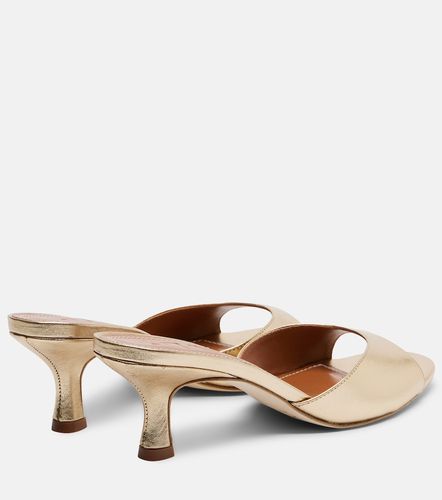 Mules à talon Brigitte 100 en cuir métallisé - Staud - Modalova