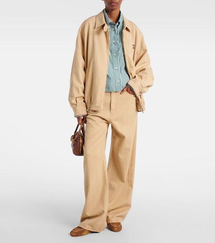 Miu Miu Jean ample à taille haute - Miu Miu - Modalova