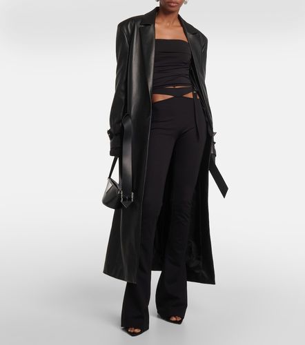 Pantalon évasé en jersey à découpes - The Attico - Modalova