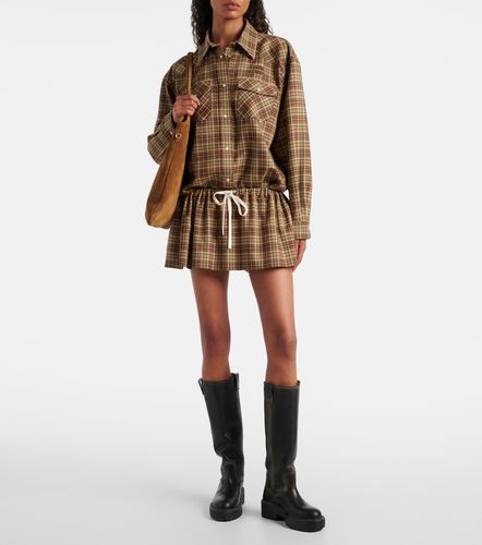 Mini-jupe en laine vierge à carreaux - Miu Miu - Modalova